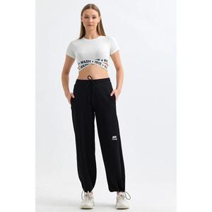 Pantaloni della tuta larghi larghi pettinati Kompac neri a due fili elasticizzati in vita - Product Image 1