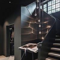 Escalier incurvé de luxe sur mesure CBMmart avec marches en bois pour villa et duplex