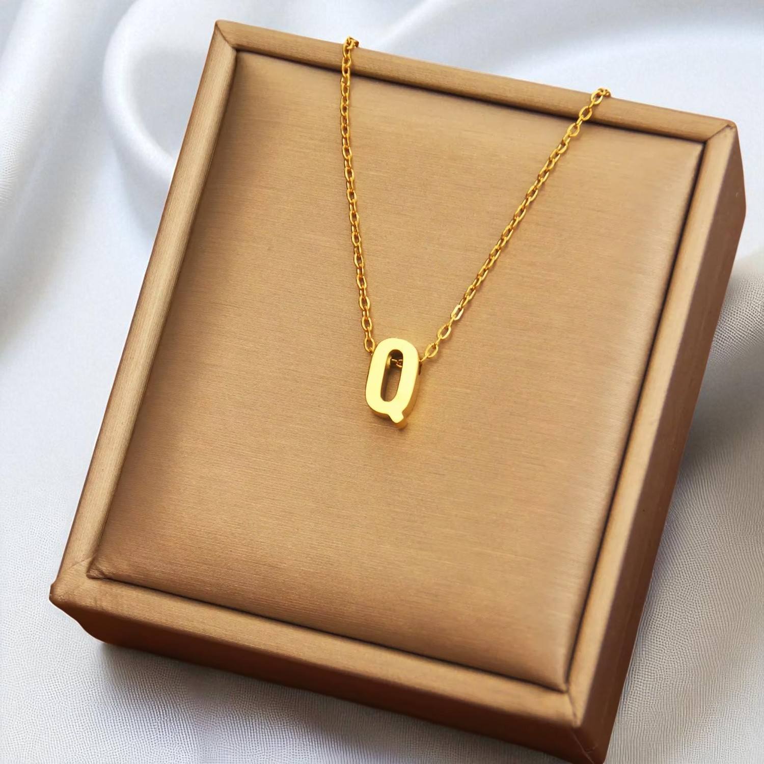 ตัวอักษร "Q"