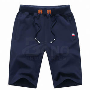 Pantalones cortos de hombre de lona sólidos de algodón 100% con cintura elástica media al por mayor, personalizados de talla grande, con cierre de cordón de secado rápido para uso informal - Product Image 1