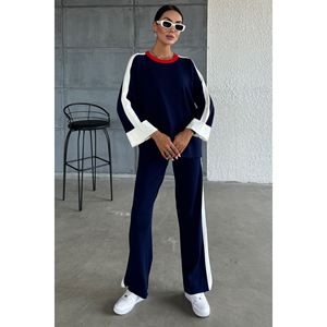 Conjunto de Dos Piezas Oversize con Suéter y Pantalones con Rayas y Aberturas - Product Image 1