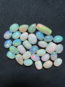 AAA หินโอปอลคาร์โบชองจากเอธิโอเปียไฟธรรมชาติหลากสีรูปไข่สีขาว/ดำ8-20มม. หินหลวมทำเครื่องประดับคุณภาพ - Product Image 2