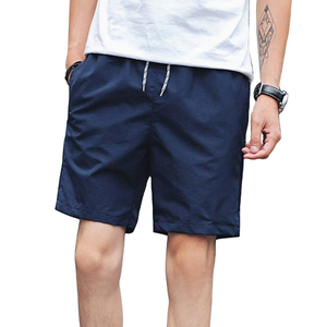 Pantalones cortos de gimnasio de alta calidad para hombre con logotipo personalizado patrón sólido ropa deportiva Fitness Joggers con bolsillos estilo pantalones cortos de gimnasio - Product Image 1