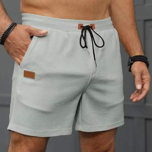 Pantalones cortos informales de punto de gofres para hombre de verano 2025, Color sólido, de longitud media, para gimnasio, atléticos, de secado rápido, transpirables, para entrenamiento al aire libre, ropa de playa - Product Image 1