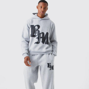 Ensemble de survêtement streetwear personnalisé délavé à l'acide avec sweat à capuche zippé et pantalon évasé effet vieilli et patchs - Product Image 1