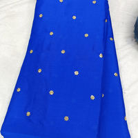 Chinnon Butti Fabric: un textile délicat et léger orné de motifs brodés complexes pour traditionnel et festif