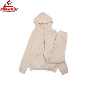 Ensembles de survêtements sur mesure en coton avec logo brodé Survêtements pour hommes Ensemble deux pièces de pantalons évasés et de sweat à capuche Survêtements - Product Image 1