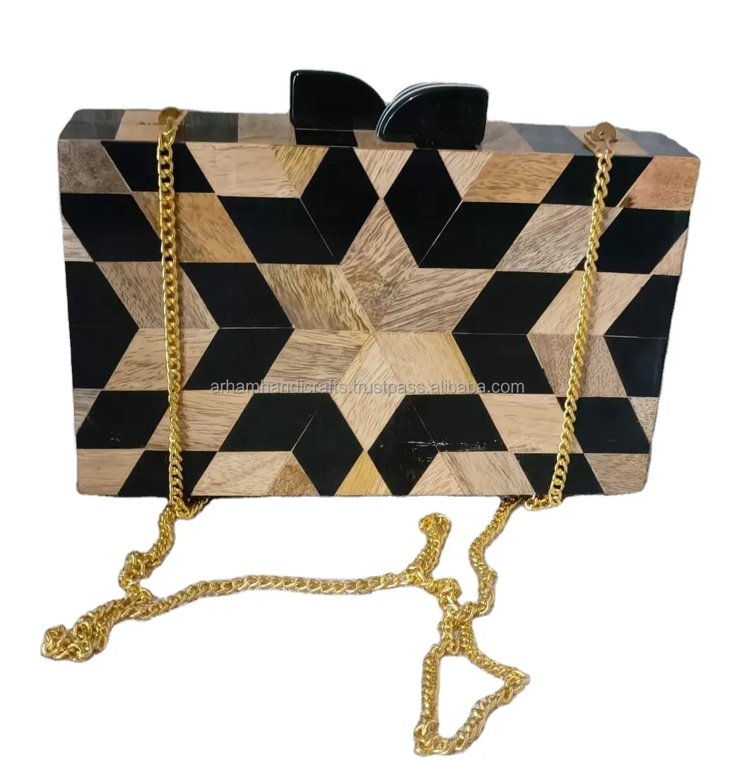 Creating a chic statement with a wooden clutch bag is an exquisite fashion choice by luxury crafts with embroidery work