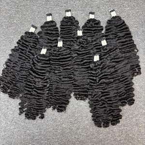 Vente en gros de cheveux humains bruts bouclés birmans dans la trame de sources de la plus haute qualité - Product Image 1