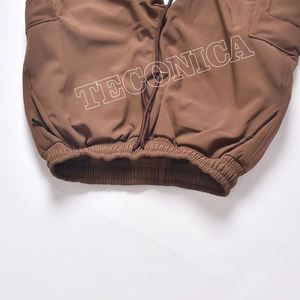 Pantalones de nieve Softshell marrón unisex, pantalones de esquí de carga impermeables a prueba de viento con bolsillos con cremallera, cintura y dobladillo con cordón ajustable - Product Image 3