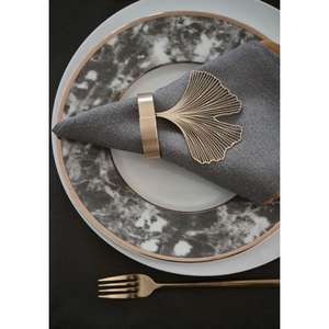 Élégants ronds de serviette en acier inoxydable avec découpes géométriques et une touche de modernité pour une table minimaliste - Product Image 6