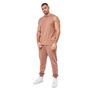 Camiseta sin mangas marrón de corte relajado para hombre, cómoda Camiseta de algodón sin mangas para gimnasio con diseño de logotipo frontal para deporte y estilo diario - Product Image 1