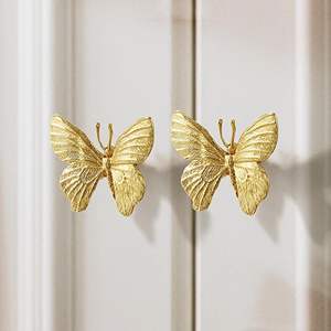 Poignées de tiroir en laiton en forme de papillon de luxe, quincaillerie décorative pour meubles, design élégant et tendance, vente en gros - Product Image 1