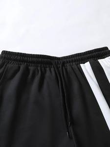 2025 pantalones cortos de verano informales de poliéster y algodón 100% de alta calidad para hombres transpirables ecológicos servicio OEM para correr Fitness sólido - Product Image 4