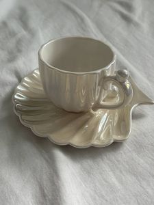 Taza de cerámica de diseño moderno de lujo para el hogar, hotel y restaurante, taza de café y té de mesa de forma redonda de Color blanco - Product Image 4