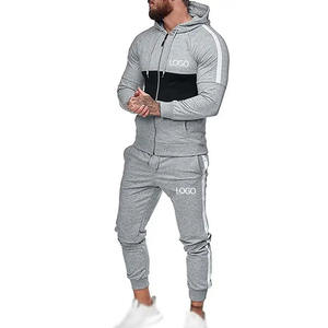 Tela transpirable 100% algodón hecho de alta calidad con rayas laterales Skinny Fitt tasa al por mayor diseño de tendencia hombres chándales - Product Image 4