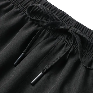 Pantalones cortos de nailon informales de Color sólido para hombre, bolsillos con cordón, ligeros, cómodos, cintura media, pantalones cortos de playa, vacaciones deportivas de verano - Product Image 1