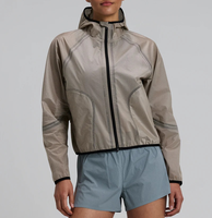 Nouvelle arrivée, veste de sport pour femmes, automne, imprimé uni, ultra-légère, coupe-vent, veste de course courte, tissu en nylon fin tissé, logo sur le devant