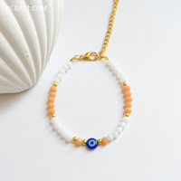 Bracelets en perles de cristal avec breloque œil porte-bonheur, style bohème, cadeau pour femme, symbolisme protecteur et design avant-gardiste