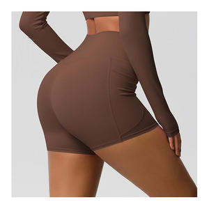 Pantalones cortos de gimnasio de moda para mujer, pantalones cortos de yoga activos de cintura alta con bolsillos laterales, cierre elástico de poliéster 100%, patrón sólido - Product Image 3