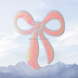 Exquisito Parche de Lentejuelas con Lazo Rosa para Ropa y Bolsos - Product Image 1