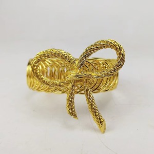 ''BOWKNOT'' Anneaux de serviette en métal, parfaits pour les réunions de famille, offrant une touche festive grâce à des finitions métalliques et des motifs détaillés - Product Image 1