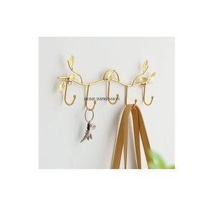 Trending Collection 2025 latón pulido dorado resistente respetuoso con el medio ambiente colgador de pared ganchos colgador de pared grande - Product Image 1