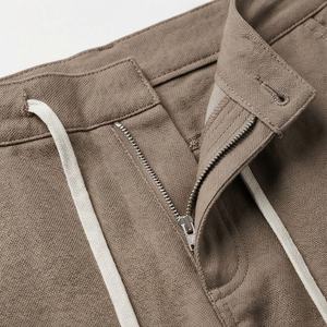 กางเกงวิ่งคุณภาพเยี่ยม มีกระเป๋าข้าง สำหรับผู้ชาย สไตล์ลำลอง ใส่สบาย ทนทาน เหมาะสำหรับออกกำลังกาย ผลิตแบบ OEM ODM ขายส่ง - Product Image 4