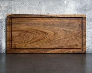 Tabla de cortar de madera premium diseñada para cocineros caseros que buscan una superficie resistente y elegante para las tareas diarias de preparación de alimentos. - Product Image 5