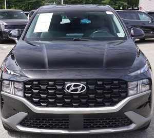 Noir étincelant 2023 Hyunda-i Santa Fe SE AWD utilisé avec jantes en alliage sièges en cuir système de navigation démarrage à distance Android Auto - Product Image 1
