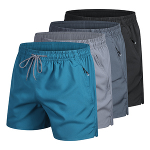 Shorts de plage d'été pour hommes couleur unie mode loisirs Double poches taille élastique Double poche Cool confortable loisirs plage - Product Image 1