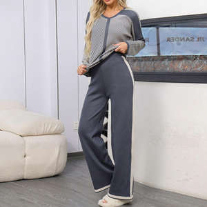 Conjunto de suéter de murciélago de punto a rayas de Color con cuello en V de Otoño e Invierno para mujer de comercio exterior, pantalones sueltos de pierna ancha, conjunto de dos piezas de punto - Product Image 1