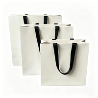 Sac en papier d'art noir de luxe personnalisé Edith pour emballage de chaussures et vêtements, avec logo imprimé, recyclable