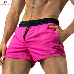 Precio bajo Verano Logotipo personalizado Imprimir Hombres Verano Color sólido Playa Deportes Pantalones cortos Hombres Pantalones cortos de baño Hombres - Product Image 2