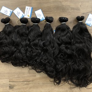 Vente en gros d'extensions de cheveux humains vierges bruts non transformés vietnamiens paquets de double trame à cuticules alignées de style ondulé naturel - Product Image 3