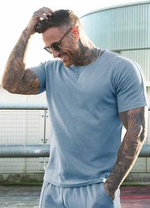 Vêtements de marque pour hommes ensembles 2 pièces vente en gros de nouveaux shorts décontractés d'été et t-shirt à manches courtes ensemble de survêtement de couleurs unies - Product Image 3