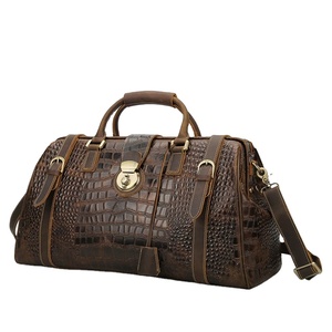 Elegant Design Cowhide Leather Duffle Bag with Spacious Interior Sturdy Handles for Sophisticated Travel Experience Duffel Bags - Product Image 1