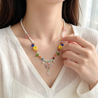 Ensemble collier et bracelet en perles de verre artisanales Boho Dopamine, bijoux colorés avec breloques papillon et feuille, cadeau pour femmes