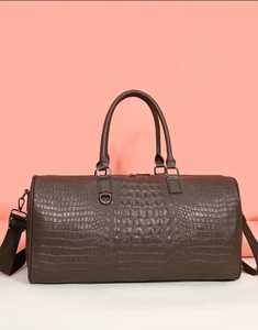 2025สินค้ามาใหม่กระเป๋าทรงดัฟเฟิลหนังแท้สำหรับผู้หญิงกระเป๋าหนังสำหรับเดินทาง - Product Image 1