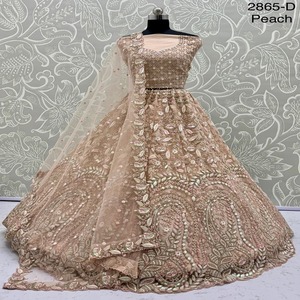 Vêtements de soirée de créateur Vêtements de mariage Filet lourd exclusif avec broderie à motif fantaisie Lehenga Choli à vendre - Product Image 1