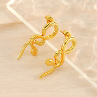 Vente en gros de boucles d'oreilles pour femmes en acier inoxydable plaqué or 18 carats boucles d'oreilles en forme de serpent torsadé imperméable à l'eau coulée bijoux fins