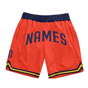 Pantalones cortos de baloncesto de retroceso auténticos de Industrie Direct Engro, pantalones cortos deportivos de tela de pana sólida naranja marino-dorado personalizados - Product Image 1