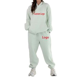 Ensemble de survêtement décontracté pour femme, hiver, en molleton de coton épais, respirant, couleur unie, avec sweat à capuche oversize et pantalon de survêtement - Product Image 1