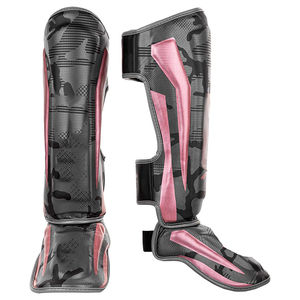 Espinilleras negras 2023 Impresión de logotipo personalizado Alta calidad Ligero Nuevo diseño Deportes Compuestos Cuero PU Plástico EVA Venta ahora - Product Image 1