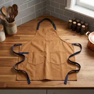 Delantal de Lona Clásico Ecológico sin Mangas con Tres Bolsillos, Lavable a Máquina para Cocinar y Uso Diario - Product Image 1