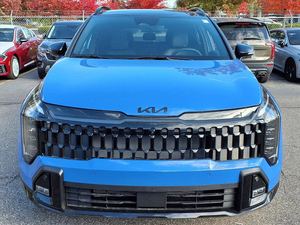 Kia Sportage X-Pro Prestige AWD 2025 Bleu Spécial d'occasion avec toit ouvrant, démarrage à distance, sièges en cuir, jantes en alliage, système de navigation - Product Image 2