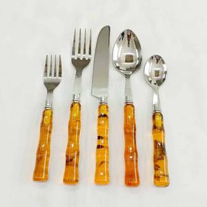 Compra cubiertos reutilizables de acero inoxidable y cerámica para restaurante, vajilla con mango redondo a granel para disfrutar de tus comidas favoritas - Product Image 5