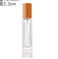 Botol Parfum Kaca Mewah Modern dengan Dekorasi Permukaan Embos, Ukuran Kustom 15ml 30ml 50ml 100ml