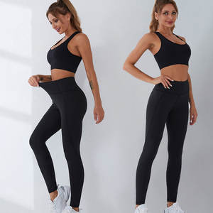 Venta directa de fábrica-Conjunto de entrenamiento de gimnasio de yoga sin costuras transpirable de alta calidad para mujer Cintura elástica Patrón sólido Logotipo frontal - Product Image 1