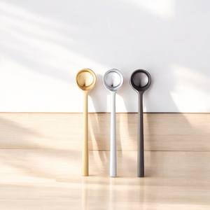 Élevez votre table à manger avec notre cuillère à thé en métal en laiton multicolore deux tons fini luxe abordable idéal pour servir - Product Image 1